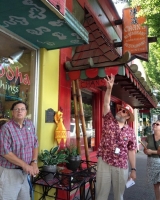 Our hosts Fred Parkinson and Gus Frederick lead the group on a walking tour of the historic downtown 